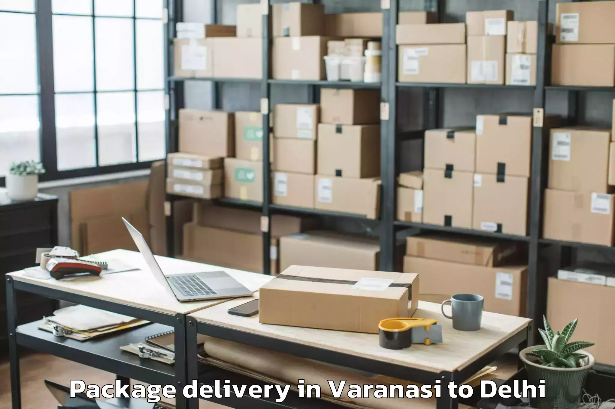 Get Varanasi to Ambience Mall Rohini Package Delivery